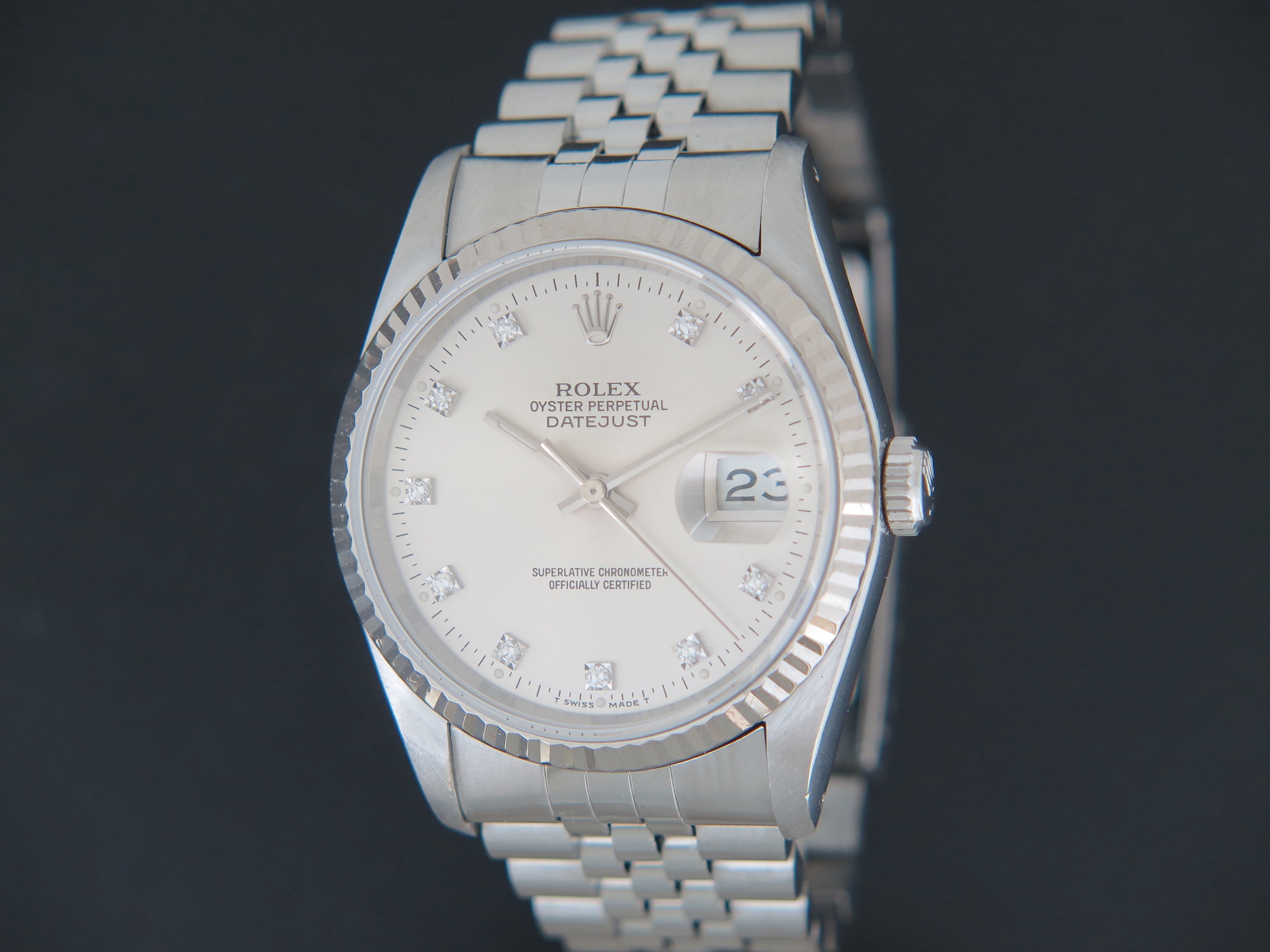 Silver rolex diamonds hot sale