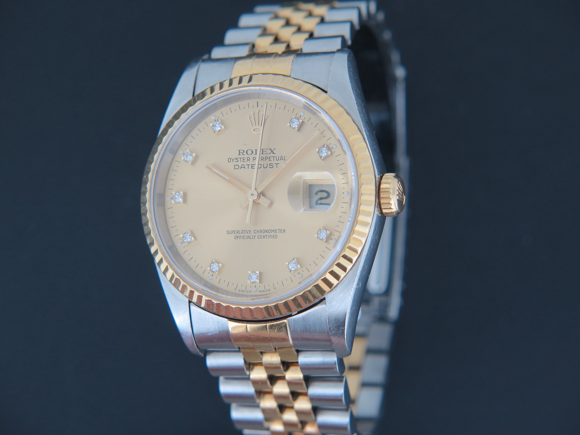 Rolex Datejust Gold Steel Champagne Diamond Dial 16233 Uhren