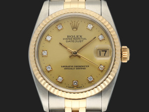 Rolex Datejust 31 Champagne Diamond Dial 68273 