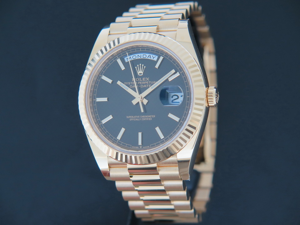 Rolex day date 40 hot sale yellow gold black dial