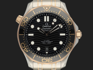 Omega Seamaster Diver 300M Co-Axial Master Chronometer Steel - Sedna Gold Black Dial 210.20.42.20.01.001 NEW