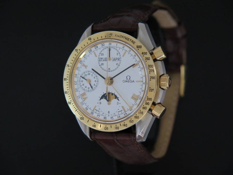 Omega speedmaster 2024 triple date moonphase