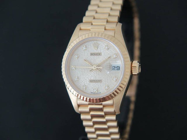 Rolex Datejust Yellow Gold Silver Logo Diamond Dial