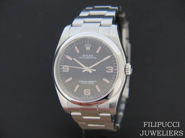 Rolex Oyster Perpetual Black Dial With Pink Index