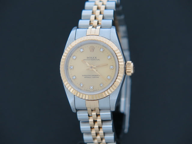 Rolex Oyster Perpetual Lady Champagne Diamond Dial